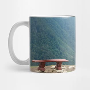 Two wooden benches with a view of beautiful mountain Mug